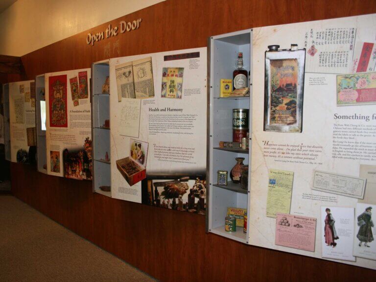 Exhibits line a wall at Kam Wah Chung Visitor Center